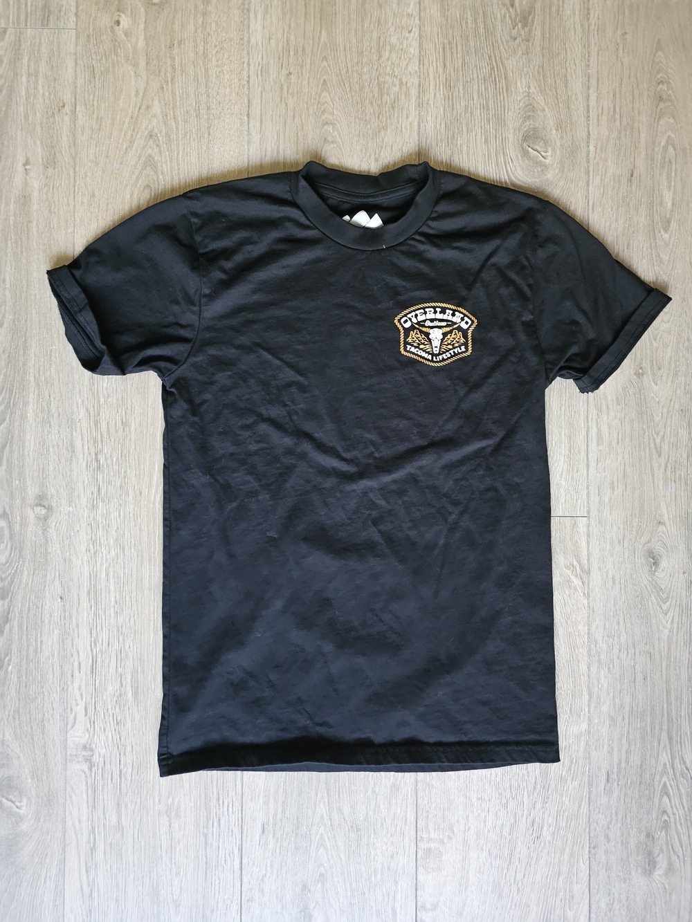 Men's Black Short-Sleeve Graphic Tee with Chest Patch